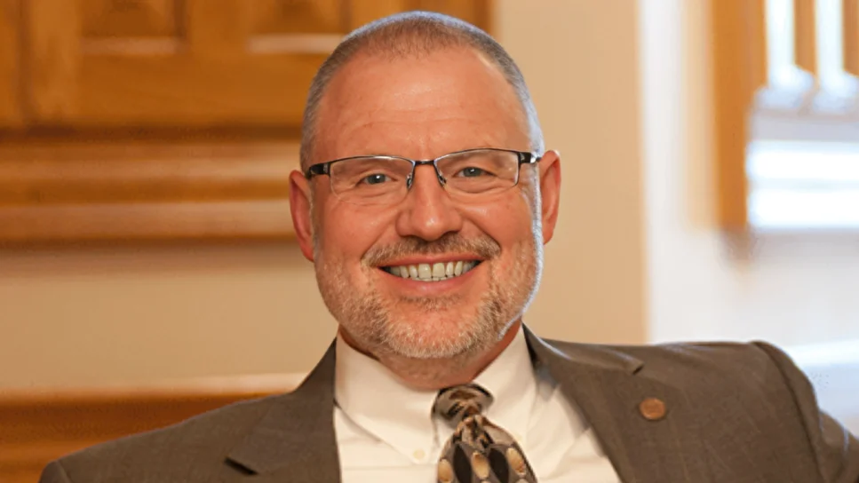 Dr. Calvin L. Troup, President - Geneva College