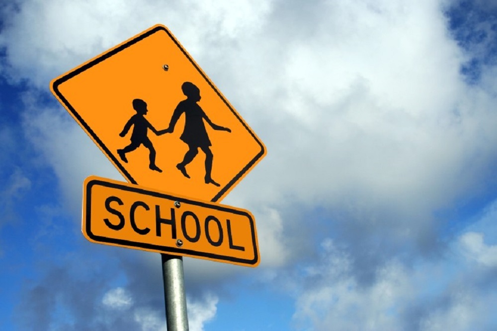 Watch for school zones and children Watch for school zones and children