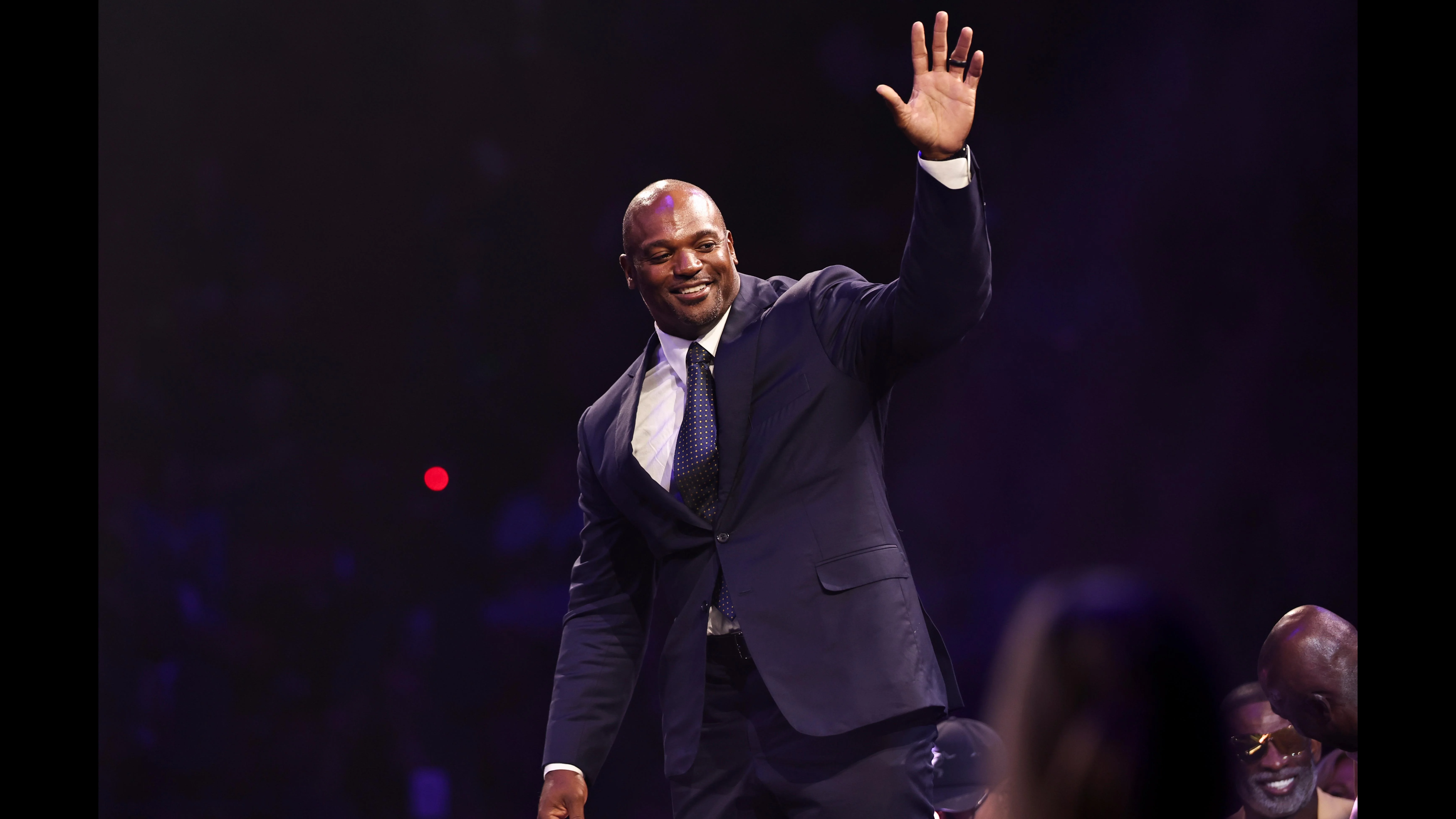 Dwight Freeney is introduced on stage during the gold jacket dinner in Canton, Ohio on Friday, Aug. 2, 2024. (Ben Liebenberg via AP)