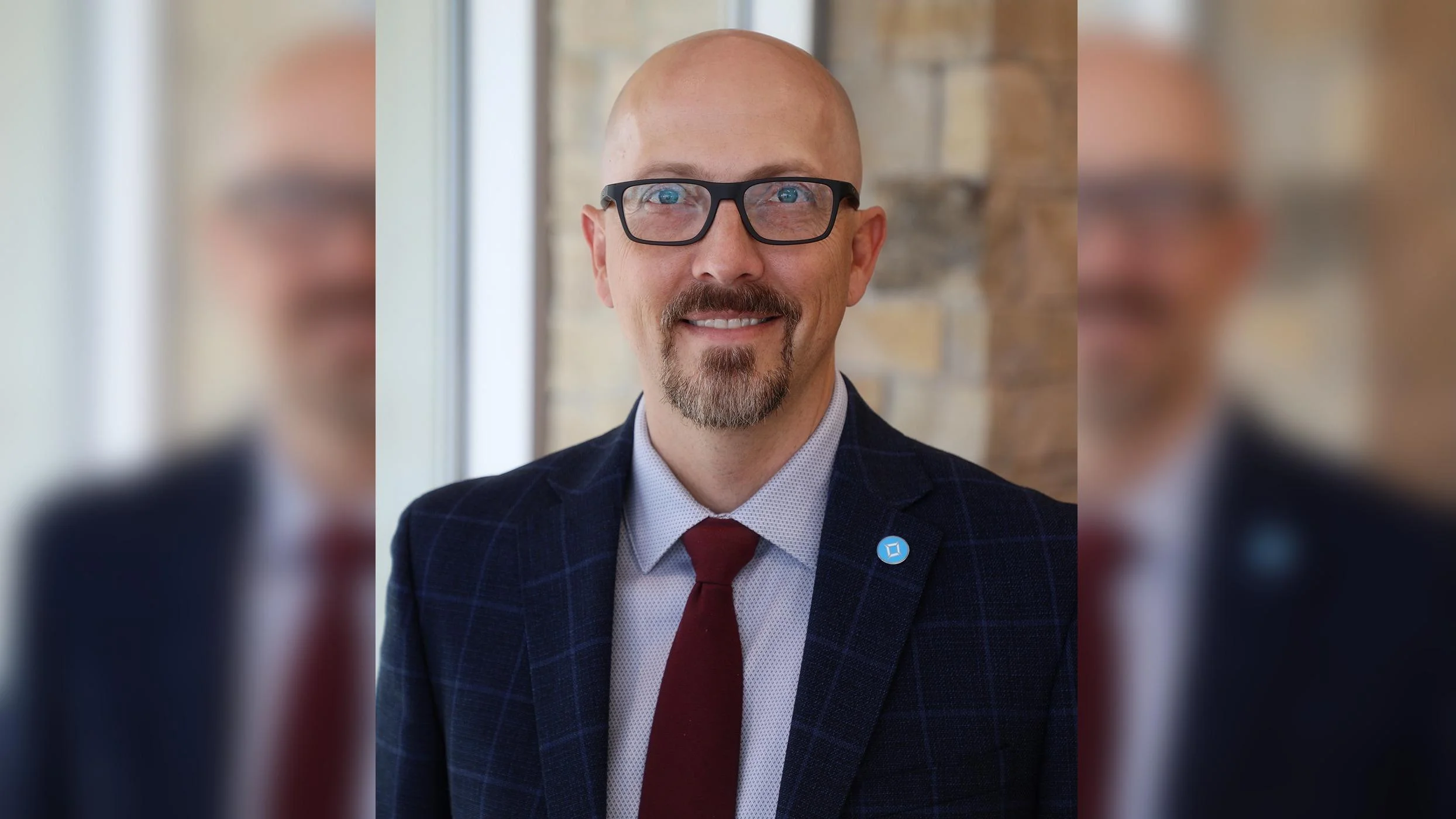 Brennan Wood President