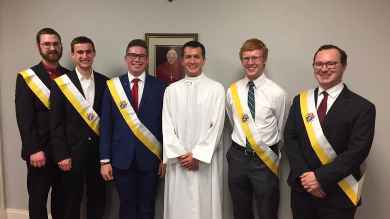 College Knights of Columbus have been honored for their exemplary service of chopping firewood for the elderly of Houghton, Michigan.