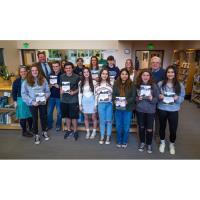 Thom Hindle donates book series to Dover public schools