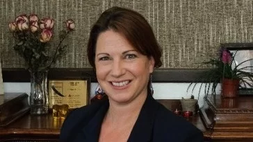 How many lawyers in good standing were practicing law in cities in Churchill County as of February?